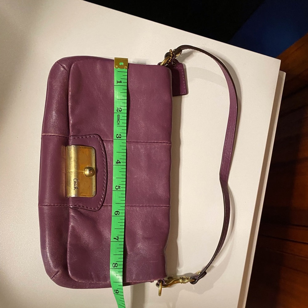Coach purple wristlet magnetic closure